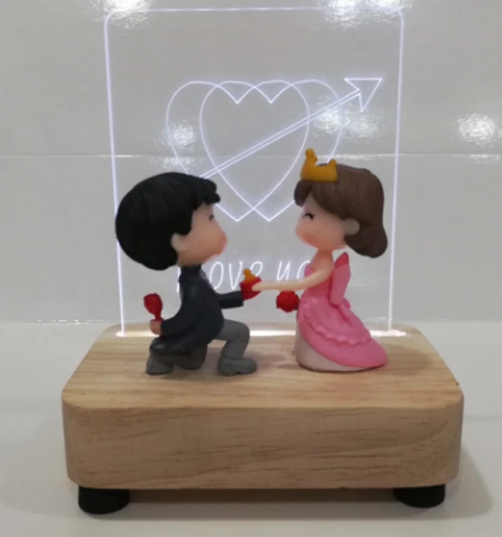 

Illuminated Glass Sitting in front of the Valentine Biblosu