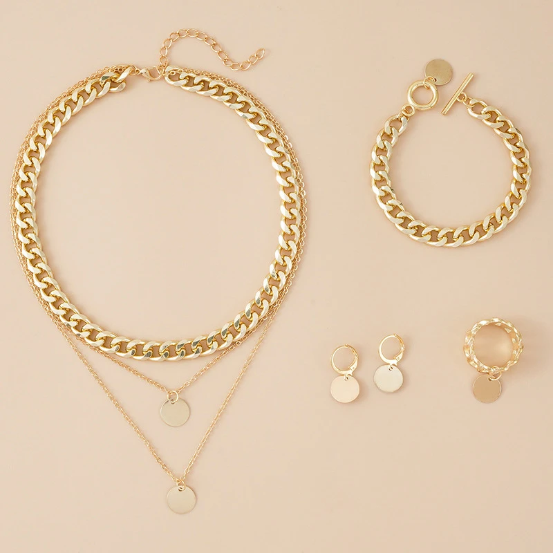 Женский комплект из колье серёг браслета и кольца