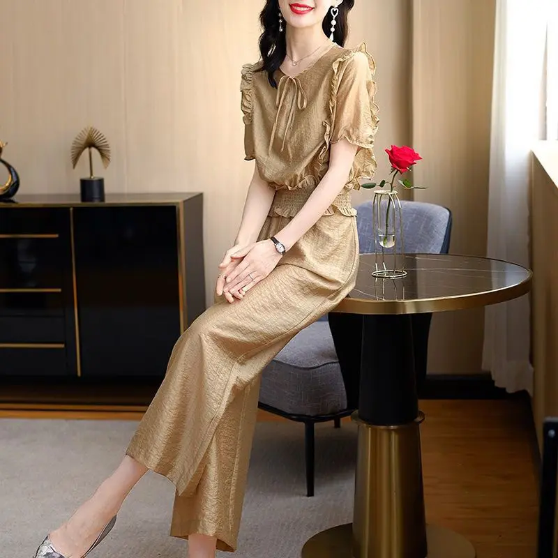 

Sets female 2022 New temperament Fried Street Western Fashion O Neck Shirt Sleeve Top Wide -leg Pants Two -piece Set Female