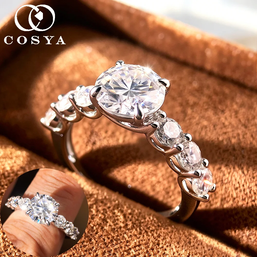 Фото Кольцо COSYA с муассанитом 3.2 карата, серебро S925, цвет D, чистота VVS, круглое, для женщин, обручальное/помолвочное, с 7 камнями, ювелирное изделие №1