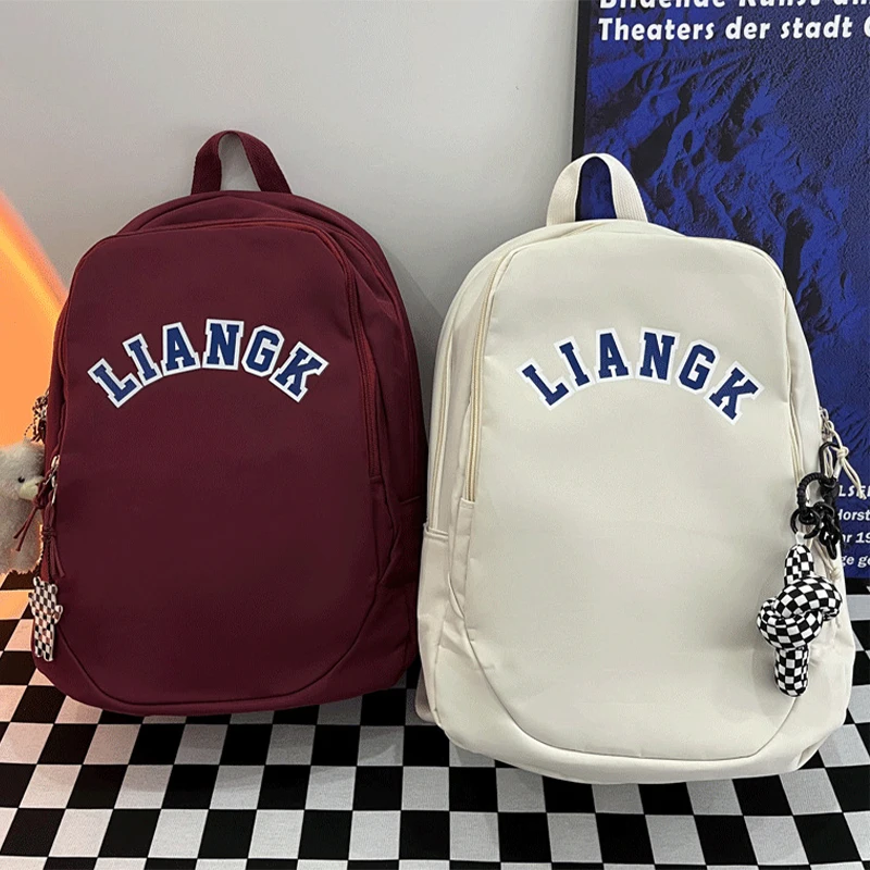 

2023 New High School And Junior High School Nylon Shoulders Female Fashion Trend College Students Schoolbag Computer Backpack