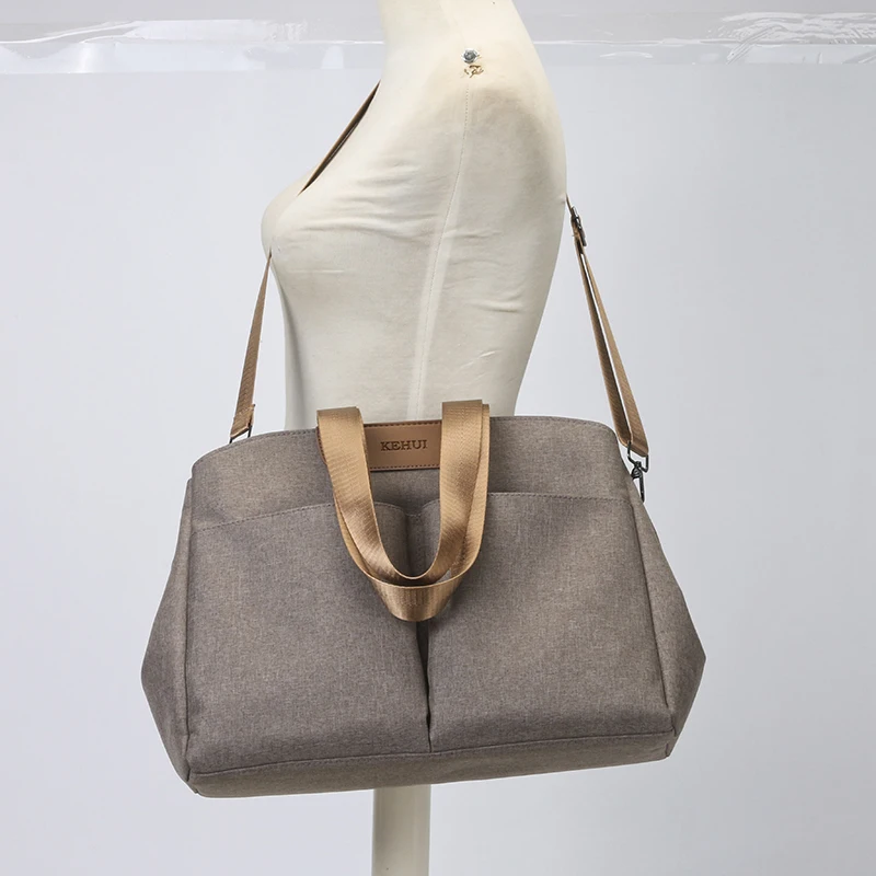 Przenośna wielofunkcyjna torba na pieluchy z zamkiem błyskawicznym i dużą pojemnością dla niemowląt marki Upnzt