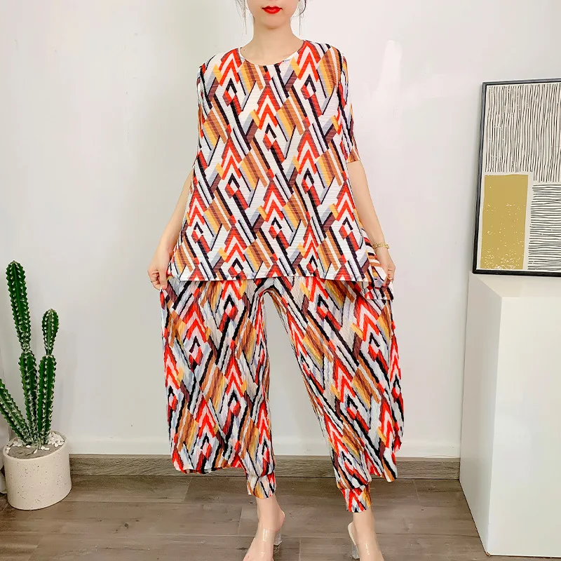 

Pleated suit summer new casual leggings+short sleeve large swing top loose two-piece set for women