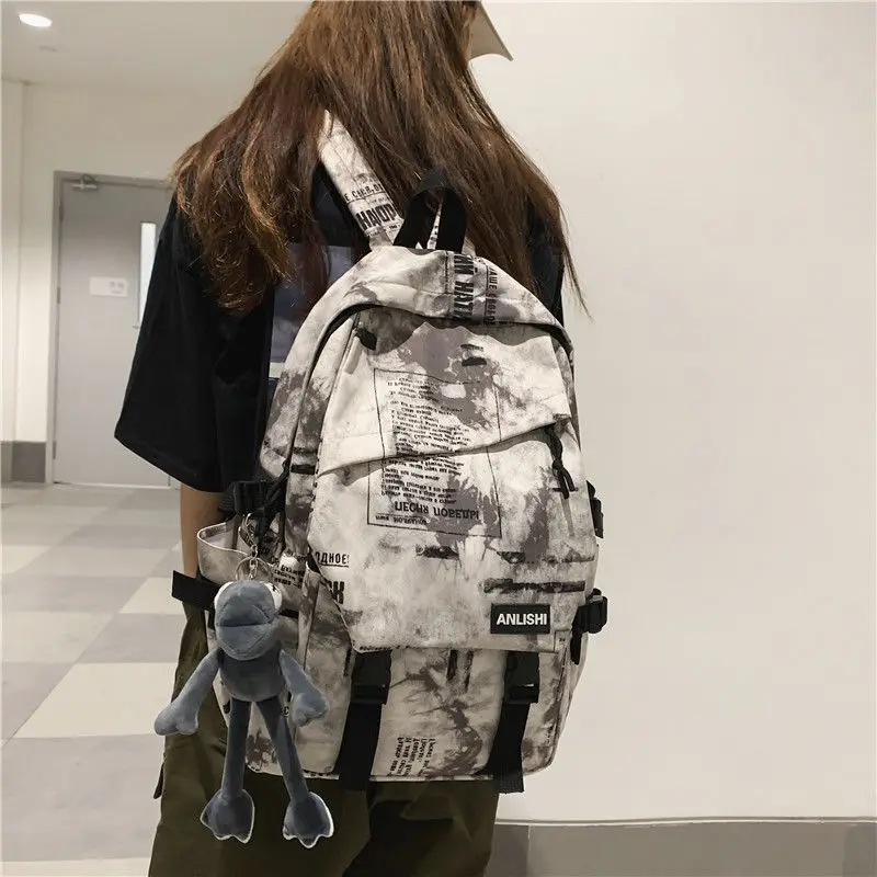 

Qyahlybz college students camouflage backpack large capacity travel backpacks for men ins boys schoolbag backpacks for teenagers