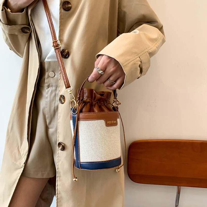 

Women Shoulder Bags Cylinder PU Leather Bucket Crossbody Bag Casual Drawstring Handbags Purse for Travel Shopping