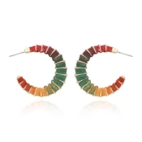 luxhoney fashion exaggerated gold plated c shaped metal hoop earrings for women with hand woven colored raffia intertwined