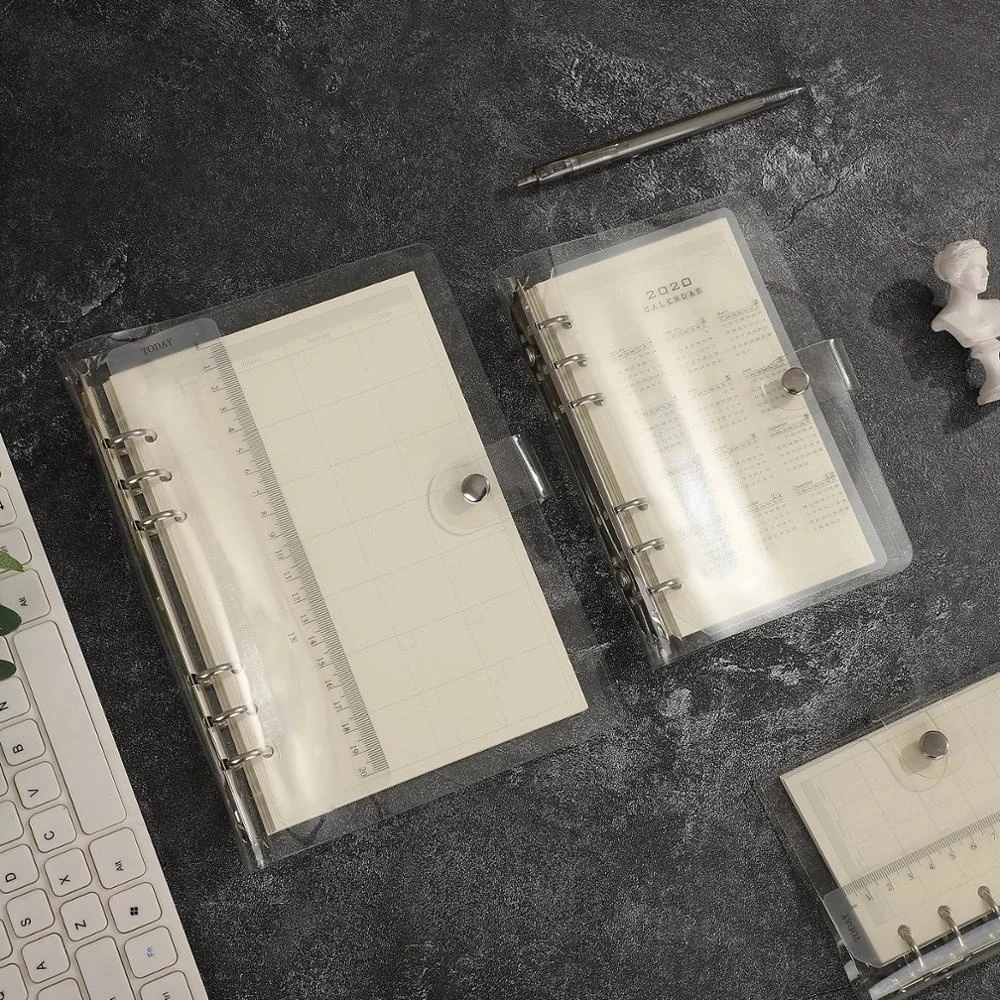 

Transparent binder with loose tape and kernel, diary and format planner