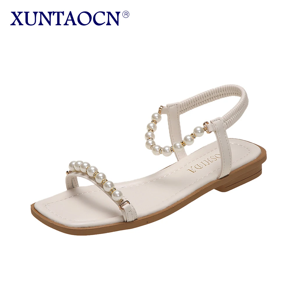 

2023 new Fashion women's shoes simple pearl one-line strap sandals female summer low heel flats female open toe
