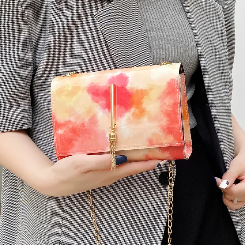

New 2022 Women Bags PVC Cloud and Fog Contrast Color Tassel Chain Small Square Shoulder Diagonal Mobile Phone Bag Wholesale