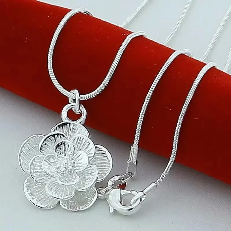 Фото Роскошные дизайнерские ювелирные наборы из серебра 925 пробы: кулоны в виде цветов, ожерелья, серьги, браслеты для женщин, подарочные аксессуары из бутика. №2