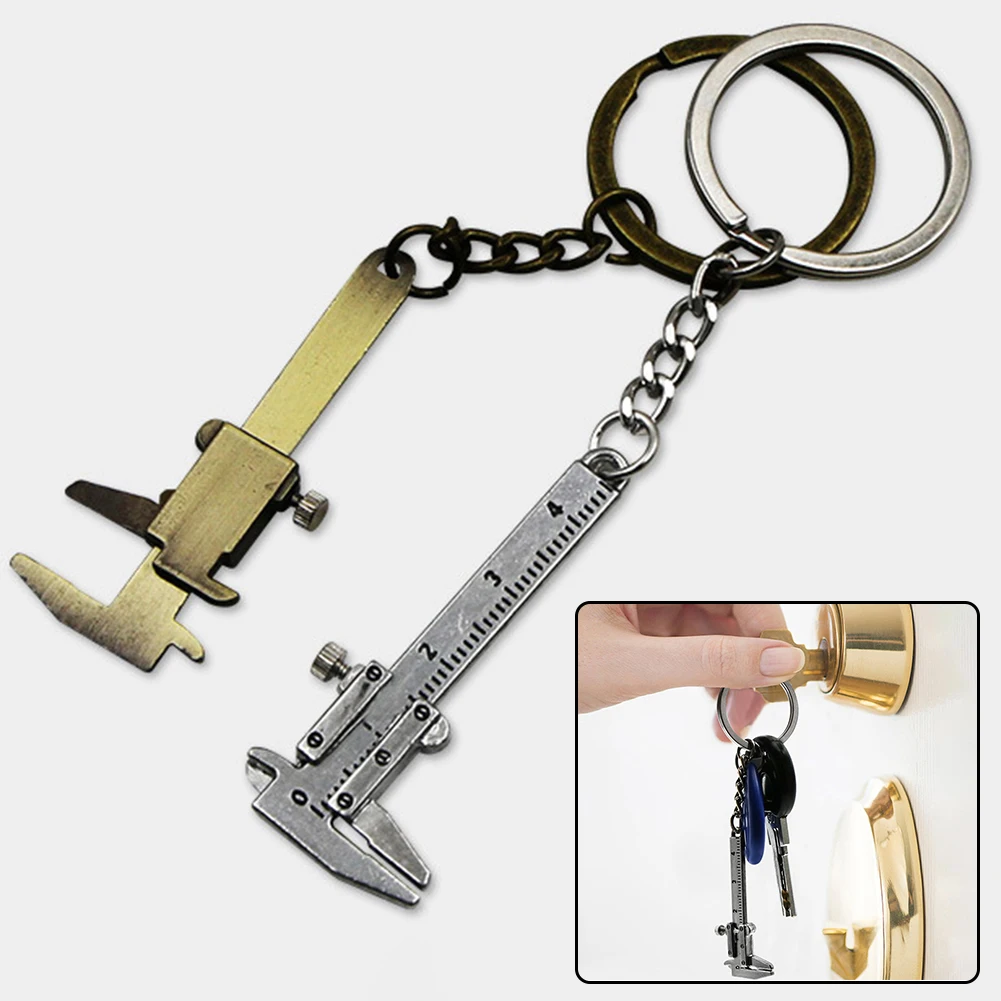 

Car Keychain Portable Mini Vernier Caliper 0-40mm Measuring Tool Keychain Clasp Ruler Hammer Wrench Pliers Shovel