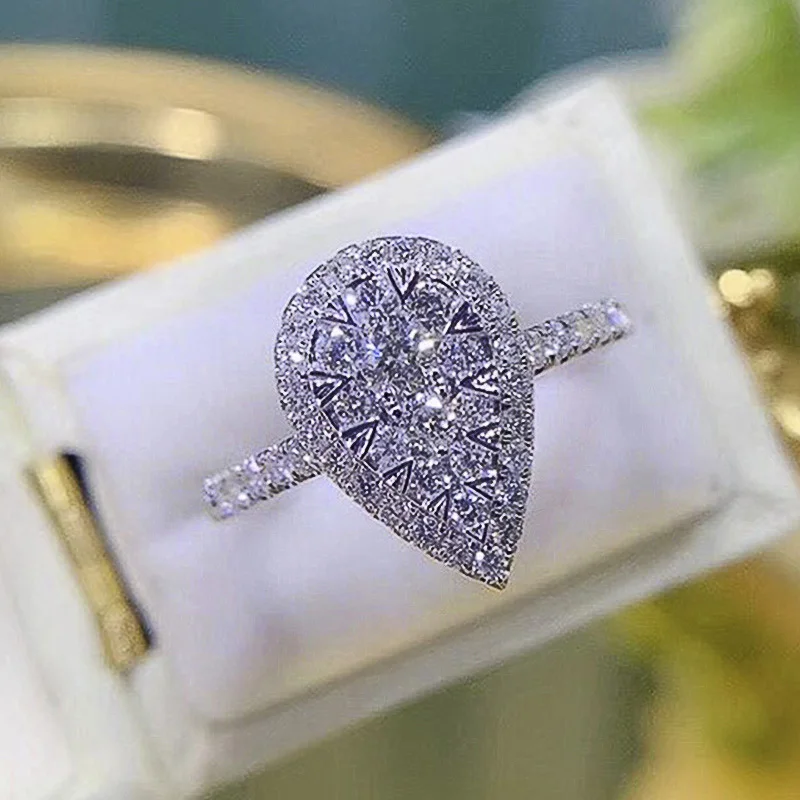 

Huitan Pear Shaped Silver Color Ring for Women Engagement Wedding Fashion Jewelry Brilliant Cubic Zirconia Rings Accessories Hot