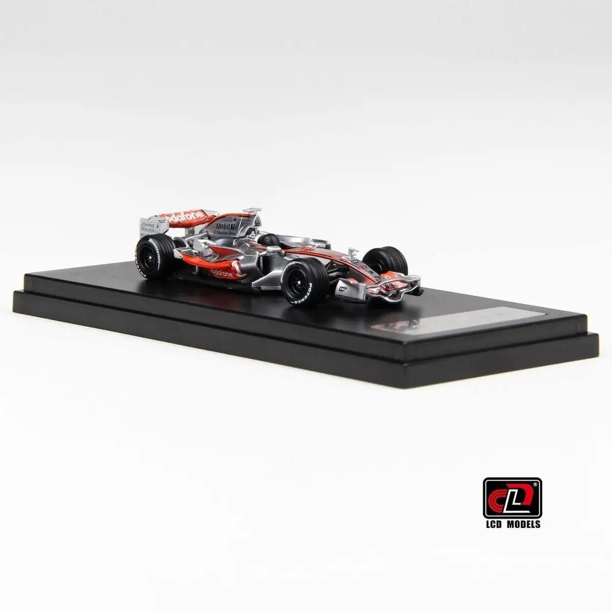 Фото Модель гоночного автомобиля McLaren MP4-23 в масштабе 1:64 из литого металла с ЖК-дисплеем №3
