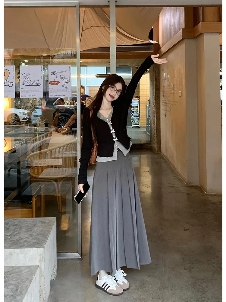 Искусственная двухсекционная короткая трикотажная рубашка с бантом женская