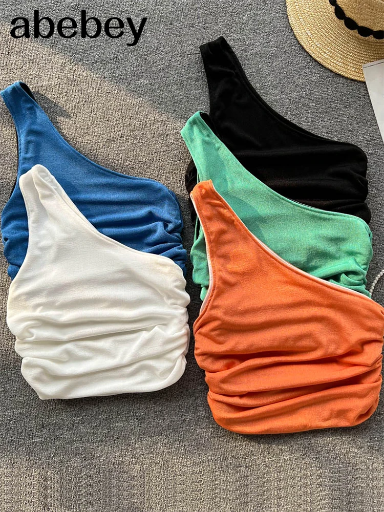 

Кроп-топ на одно плечо, женский короткий топ с рюшами, сексуальный женский летний топ, белый, черный, зеленый, оранжевый укороченные топы на б...