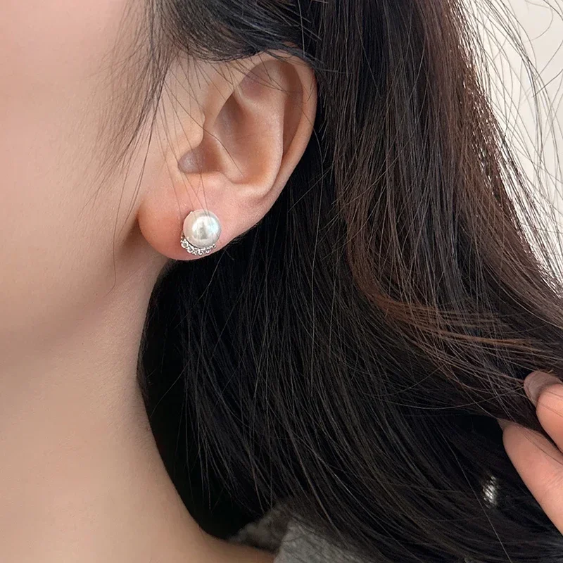 Серьги-гвоздики с жемчугом и цирконом серебро 925 пробы