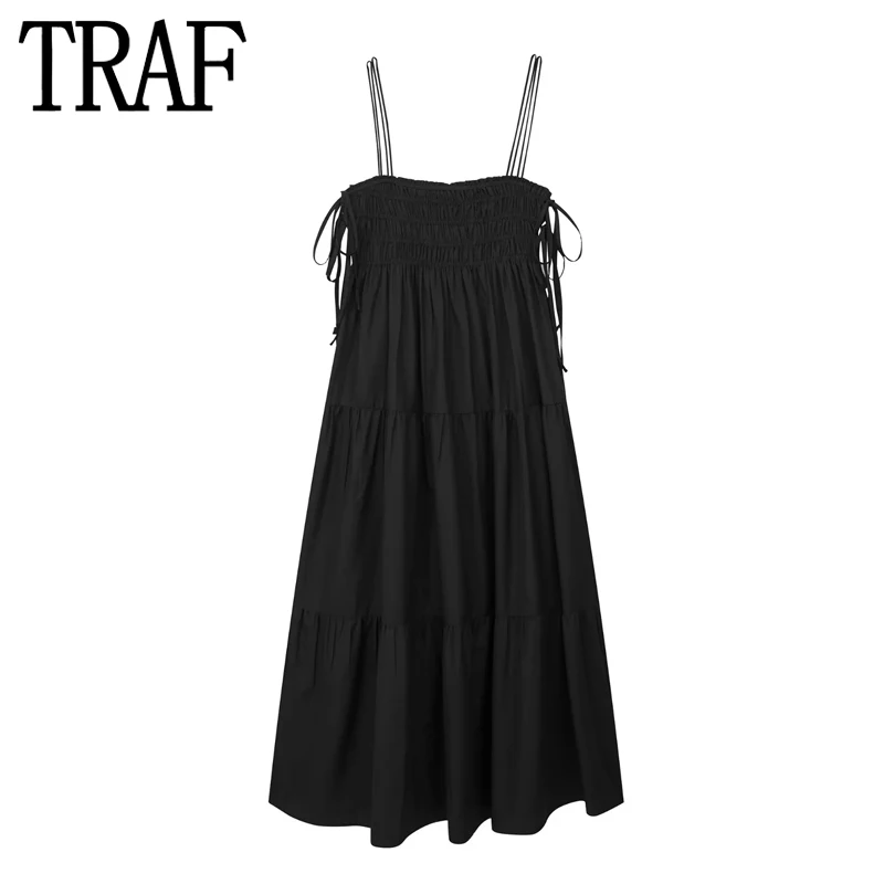 

Платье-комбинация черное длинное с оборками и бантом, без рукавов