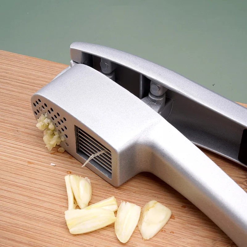 

Kitchen 2 in 1 Garlic Press Mincer Manual Garlic Crusher Squeezer Garlic Chopper Slicer Vegetable Tools