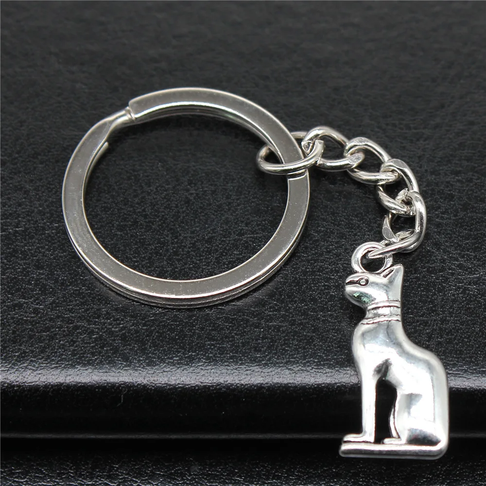 Сувениры подарок мужской брелок 2 цвета 25x12 мм с подвеской в виде египетского кота