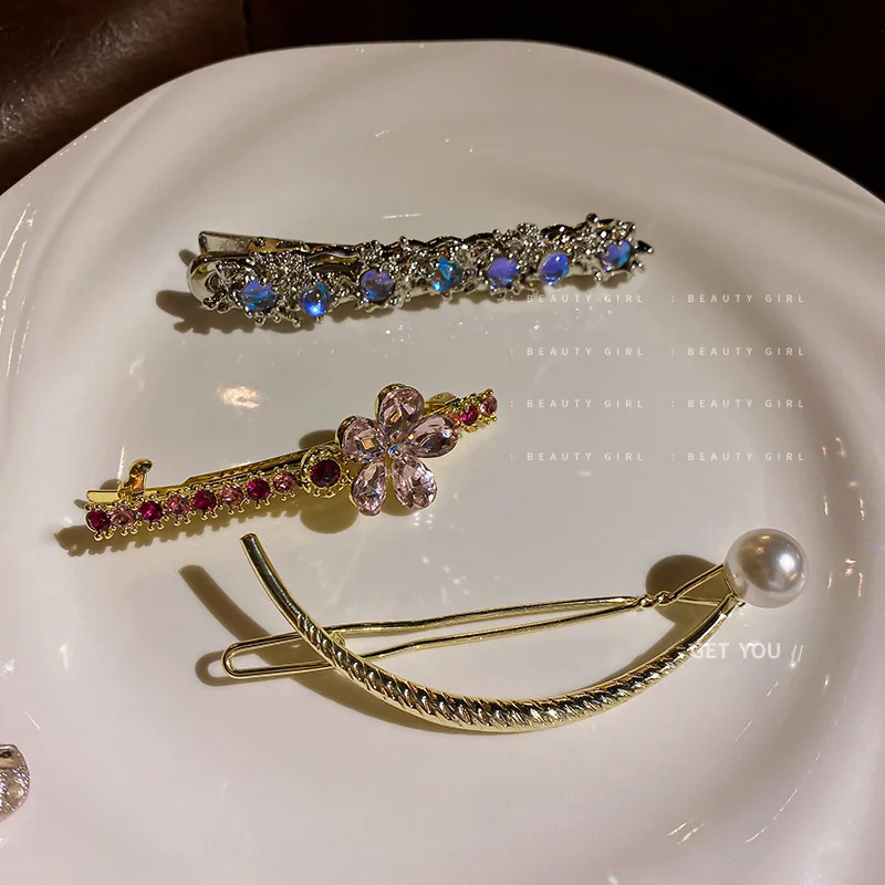 

Trendline Red Moonstone Pleated Hair Clip Ins Style Pearl Crescent With Diamond Flower Design