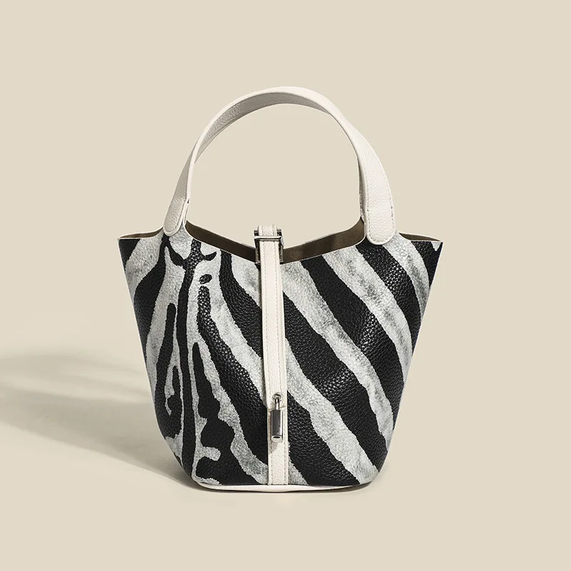 

Брендовая роскошная женская сумка, новинка 2022, трендовая модная сумка-ведро с граффити, корзина с капустой, сумка для подмышек, кошельки и су...