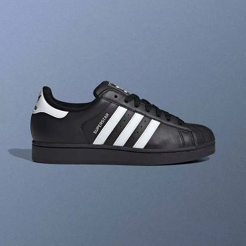 Фото Кроссовки Adidas JI0079 Icon Shell Toe, черно-белые, с тремя полосками, из премиальной кожи, с износостойкой резиновой подошвой, для повседневной ходьбы №2