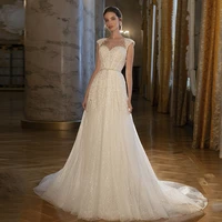 luxury wedding dresses sparkle o neck a line beaded wedding gowns sexy open back tulle sweep train bride dress robe de mari%c3%a9e