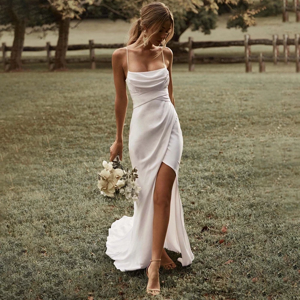 

2022 Modern Bohemian Mermaid Wedding Dresses Spaghetti Straps Pleats Sexy Split Bridal Gowns Bow Hollow Backless Summer Bride