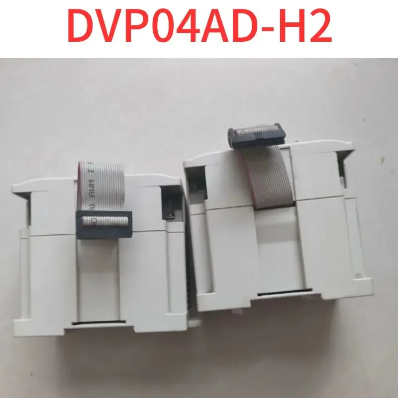 Б/у Модуль расширения ПЛК DVP04AD-H2 имеет хорошую функциональность.