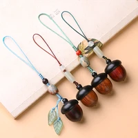 chinese style red sandalwood pine cone acorn mobile phone chain pendant key chain can be openedclosed bag couple pendant jewelry