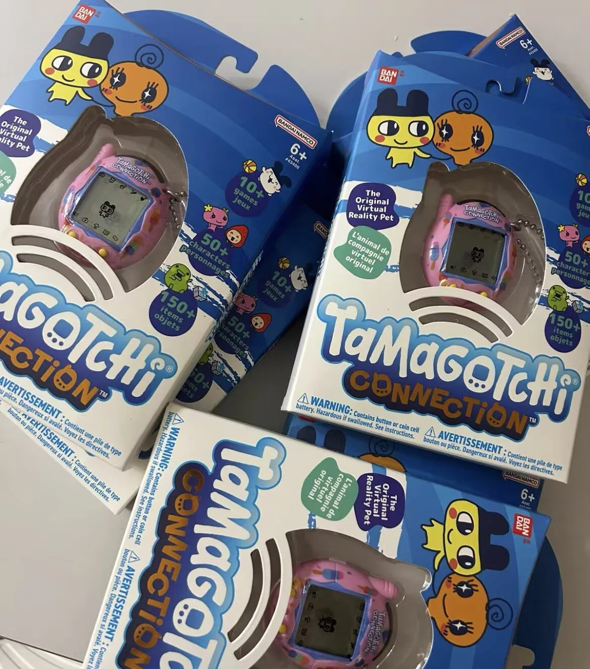 Фото Электронная интерактивная игрушка Bandai Tamagotchi Connection V3 с 10 мини-играми и более 50 персонажами, подарок на день рождения для детей №5
