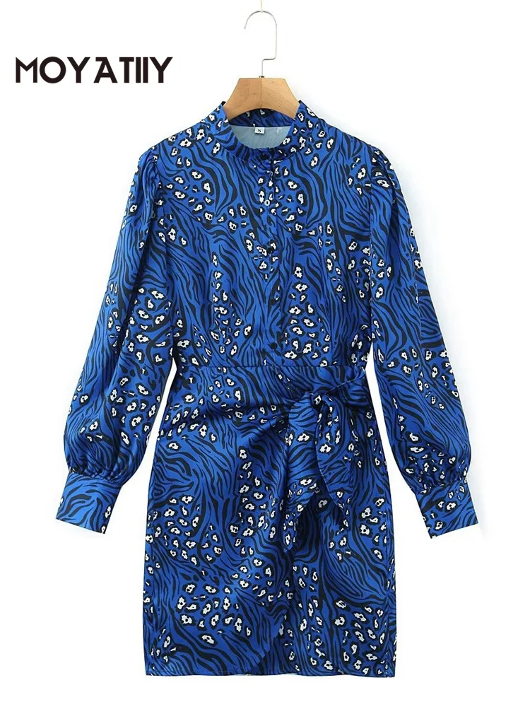 

Женское мини-платье с бантом и длинным рукавом