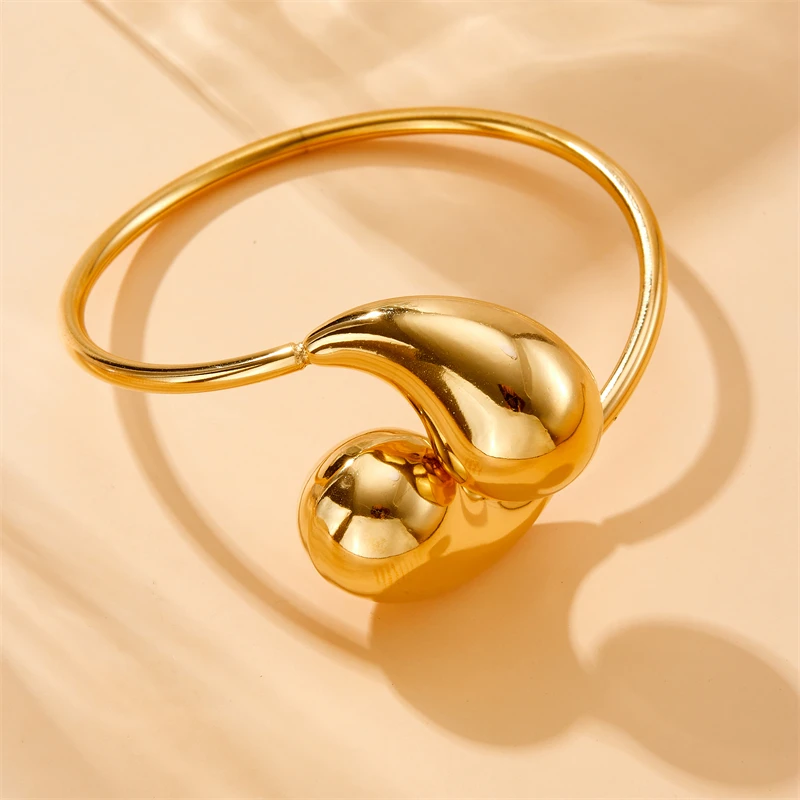 Браслет MEYRROYU открывающийся из нержавеющей стали 316L золотого цвета в форме капли