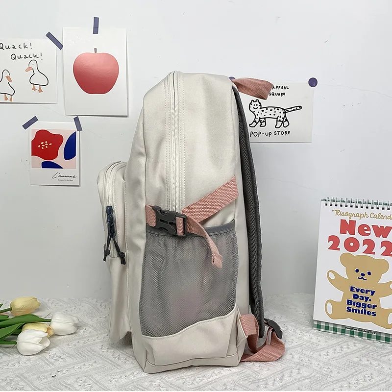 Fashion backpack female junior high school students high school students Japanese simple schoolbag leisure Computer Backpack