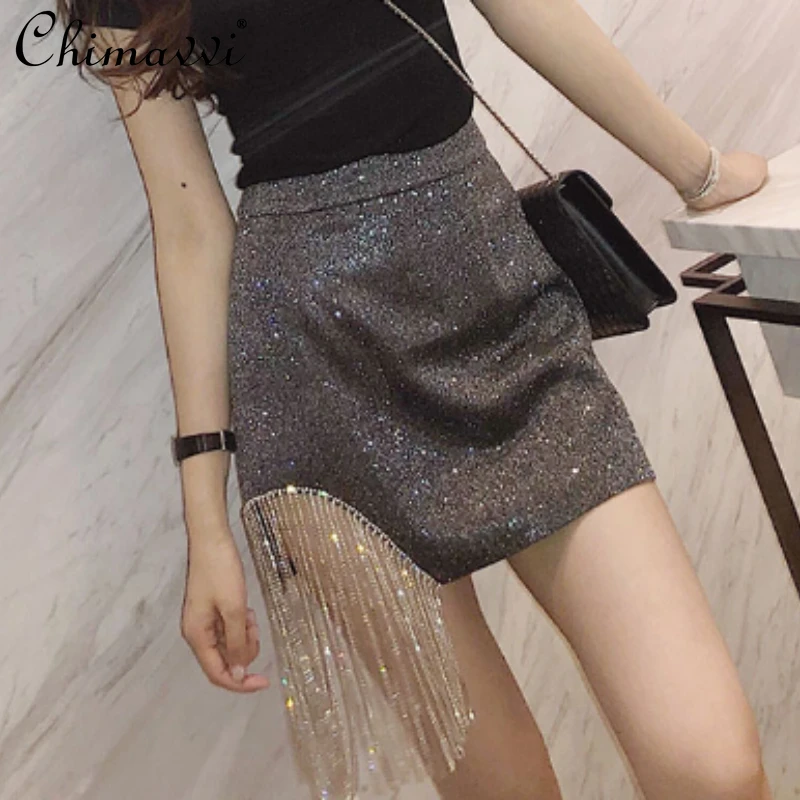 

New One-Side Drill Chain Tassel Above Knee Skirt Women's 2022 Spring Fall Fashion Shiny Silk Irregular Sexy Streetwear Hip Skirt