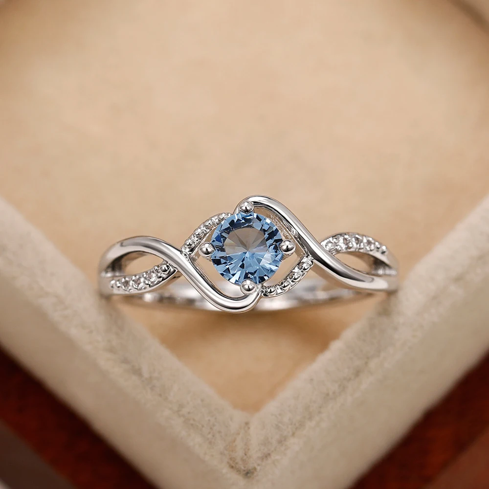 

Huitan Fancy Twist Design Blue CZ Rings High Quality Silver Color Wedding Bands Women Rings Unique Birthday Gift Fashion Jewelry