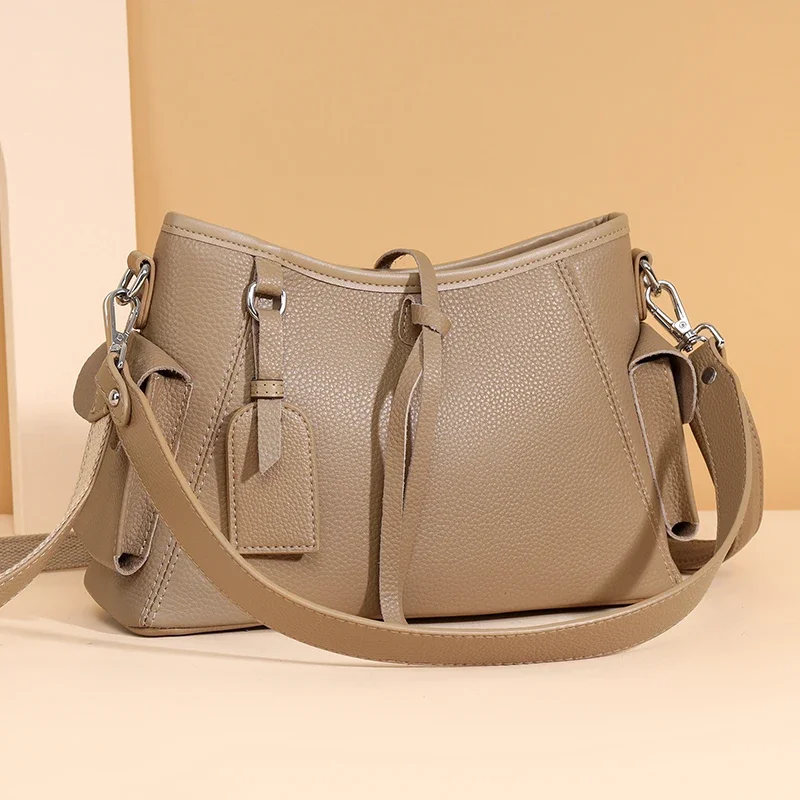 Женская сумка из коровьей кожи большая вместительная через плечо