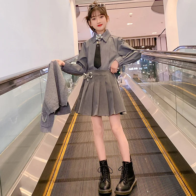 

Весенний костюм для девочек 2022 года, модное маленькое ароматное пальто, плиссированная юбка, костюм из трех предметов в студенческом стиле ...