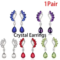 delysia king crystal earrings