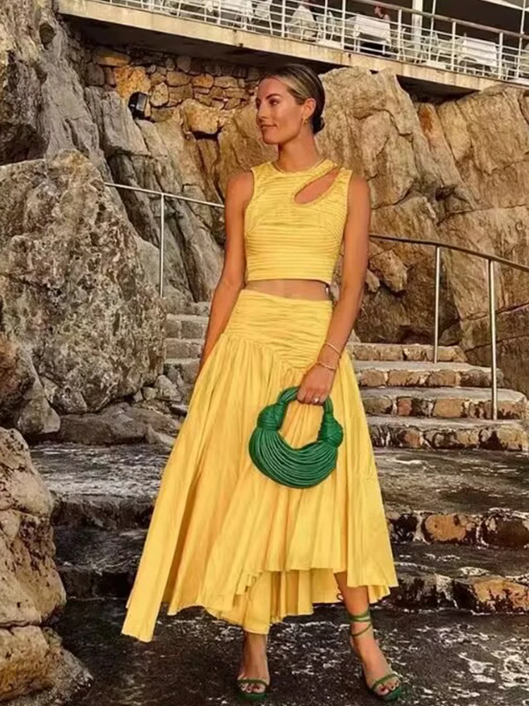 

Designer retro pleated hollow short vest top two-piece women's summer new + high waist pleated irregular skirt fashion suit