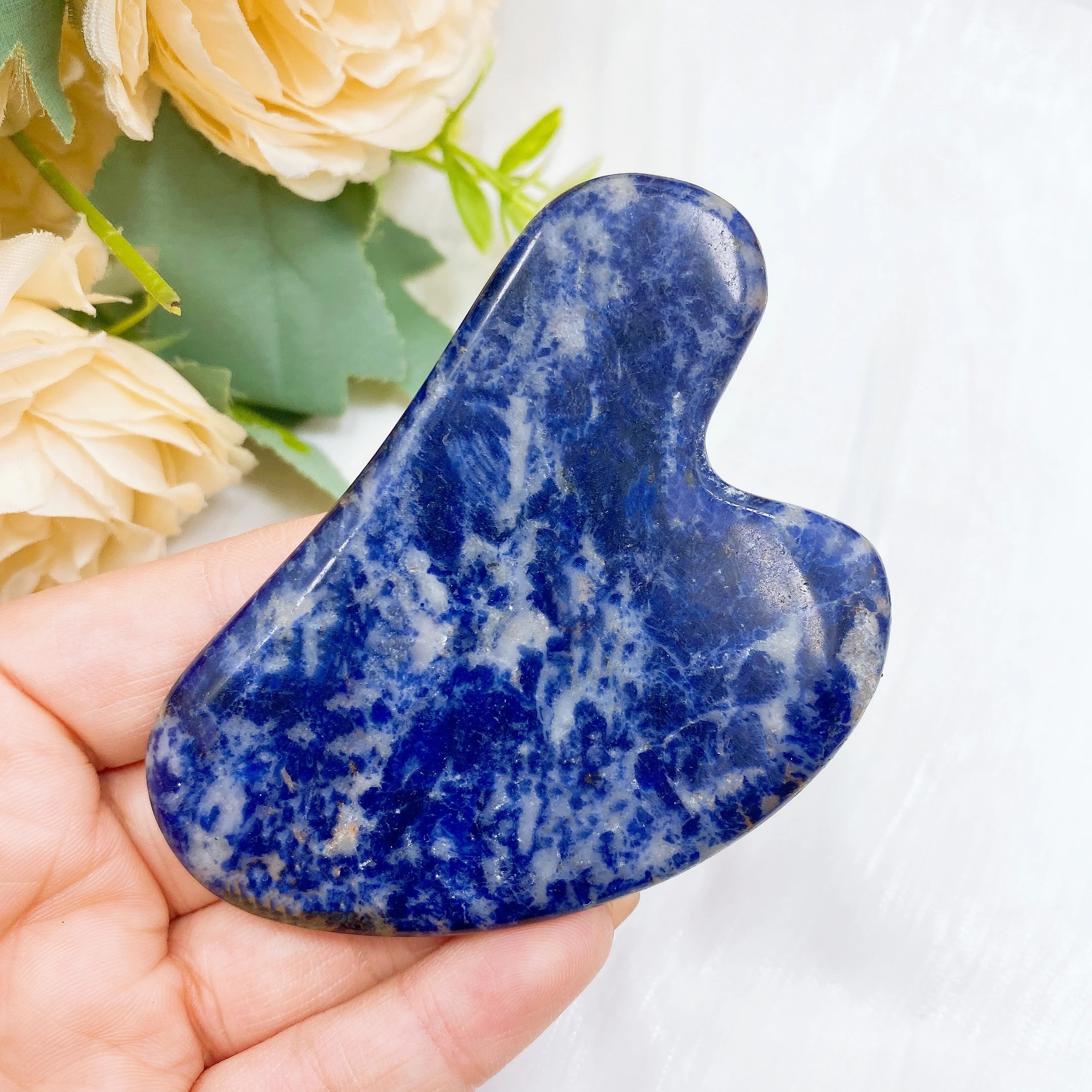 

Скребок для массажа из розового кварца