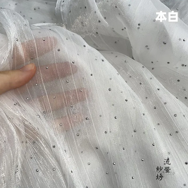 Тёмно-синяя блестящая ткань из органзы с эффектом сверления