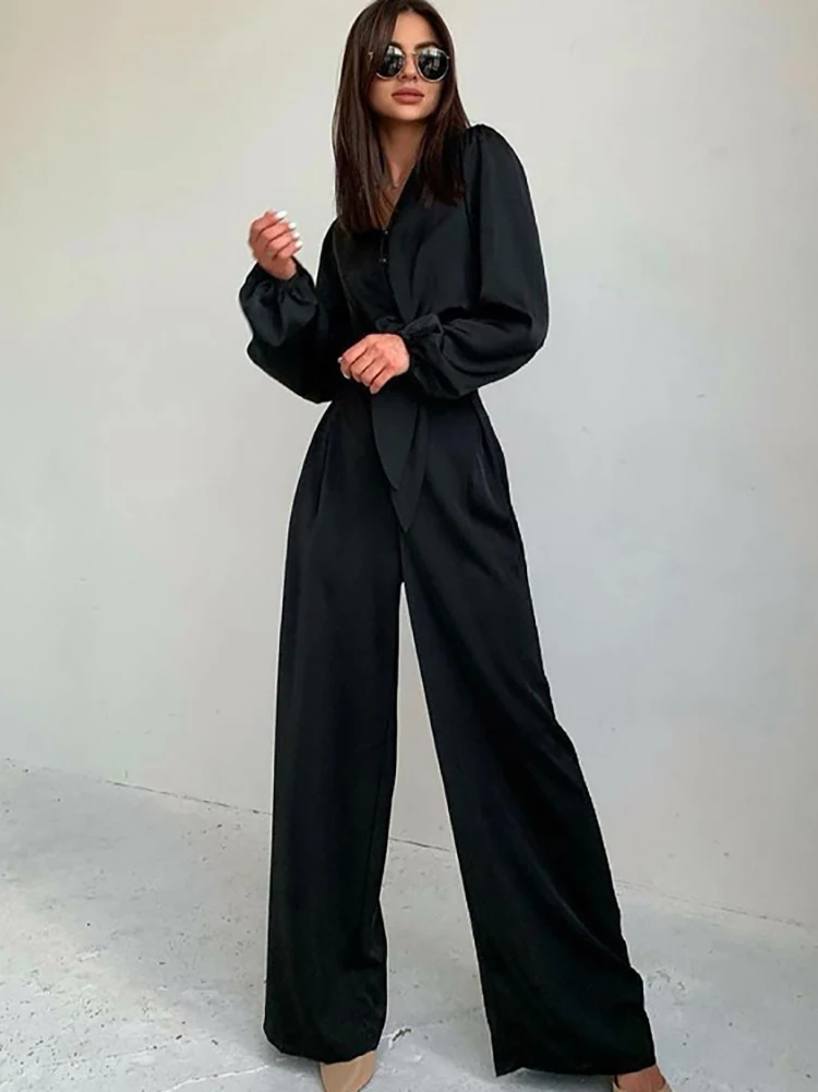 

Повседневные Черные брючные костюмы Mnealways18, комплект из двух предметов для женщин, рубашка с V-образным вырезом и бантом и мешковатые брюки, ...