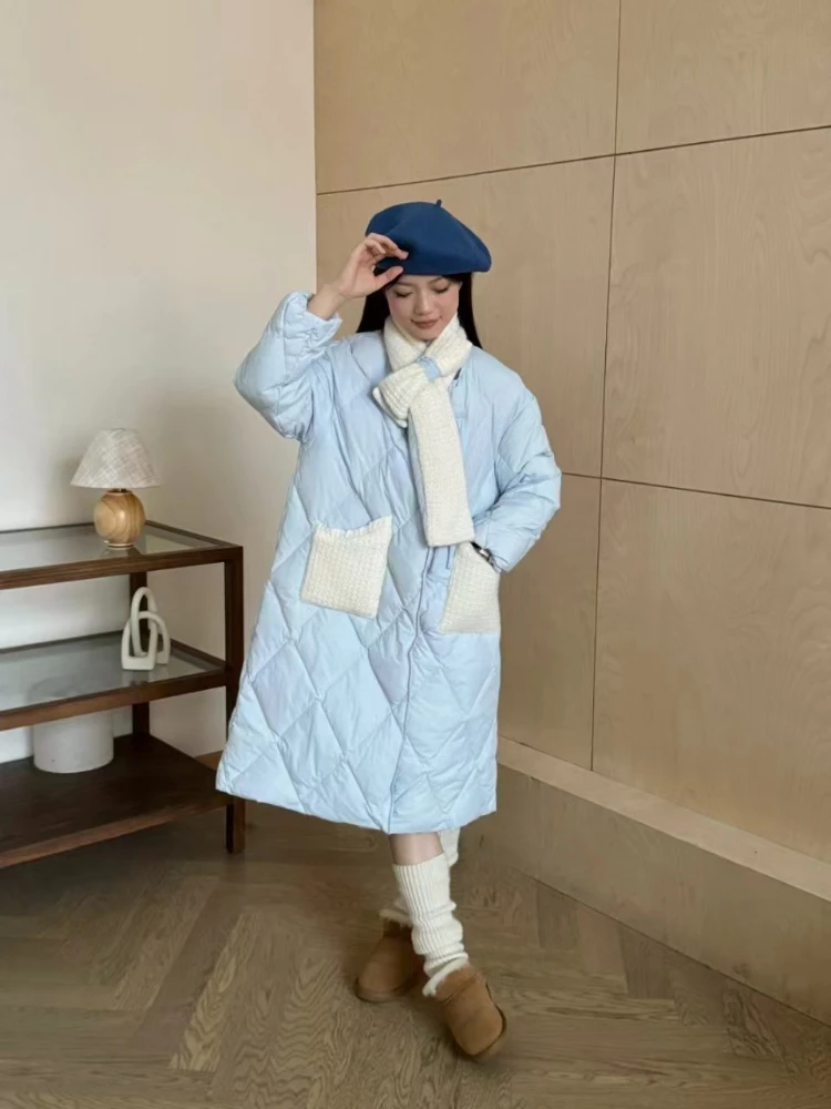 Женский пуховик средней длины до колена