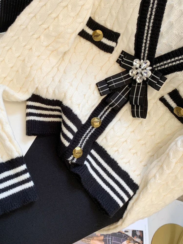 Женский трикотажный кардиган с бантом и V-образным вырезом