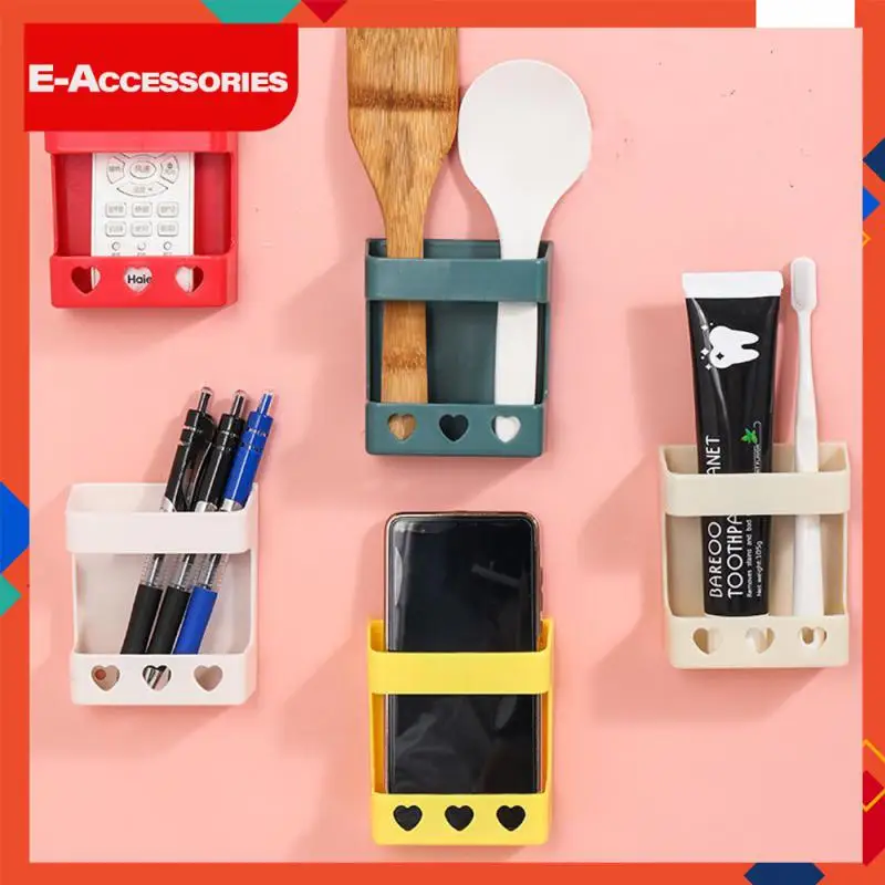 

Multi-functional Remote Control Rack Phone Shelf Adhesive Adhesive Sundries Charging Storage Rack 1pcs Mobile Phone Holder New