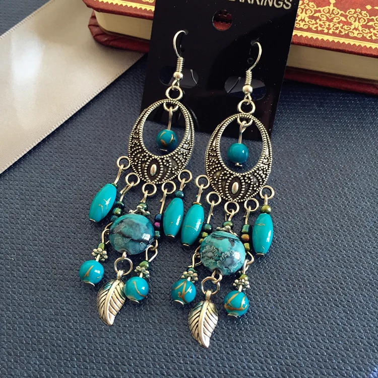 Bohemian style European and American ancient silver earrings goddess jewelry show face thin earrings tassel long earrings