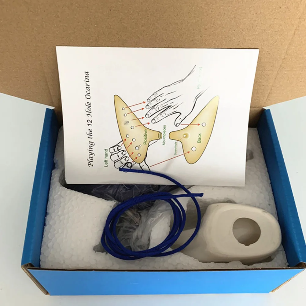 

Набор канавки Ocarina 12 отверстий со шнурком и держателем Ocarina + музыкальная книга 290 г/10,23 унций 6,29*3,93 * 1.57in Alto C Legend