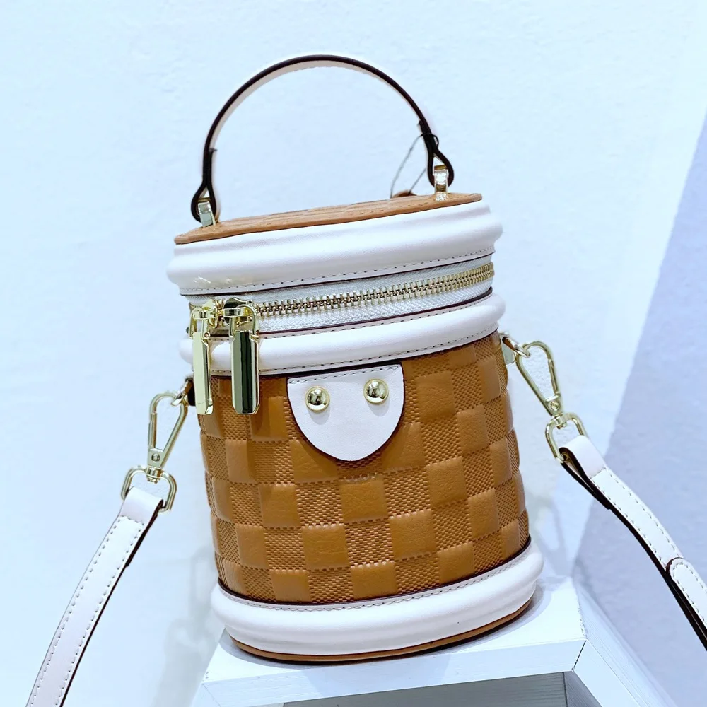 

2022 new small bag niche new high-end cylindrical leather fashion messenger bag portable bucket bag all-match women's bag