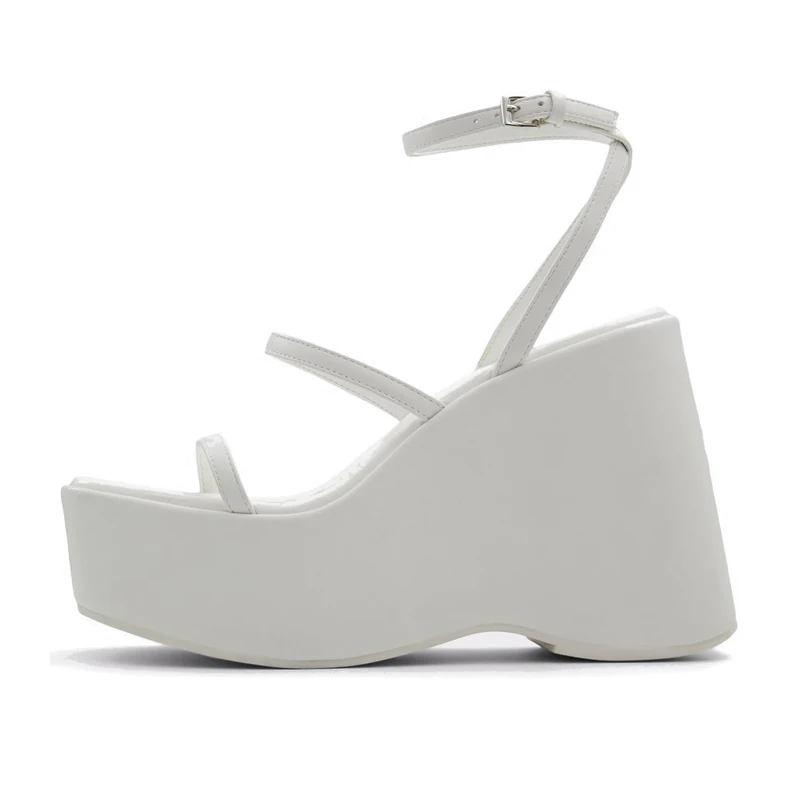 

Женская летняя обувь из натуральной кожи на танкетке с открытым носком